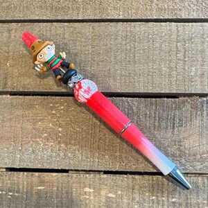 Red and Black Horror-Themed Pen